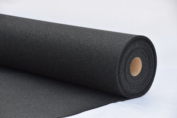 Roll of black gym floor insulation material on a white background