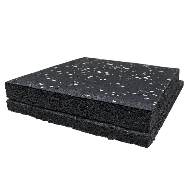 Two stacked black rubber mats, 10mm shockpad with 20mm Terrafit Duo Gym Tile with white speckles on top, shown on a plain white background.