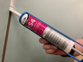 Acoustic Sealant being used to seal plasterboard joint on wall.