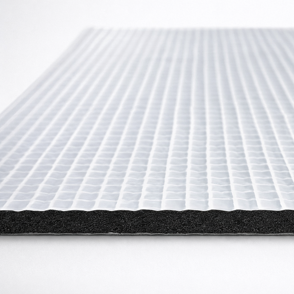 Cross-section of SilenceCORE acoustic lagging showing foil facing, acoustic barrier, NBR foam and self-adhesive backing