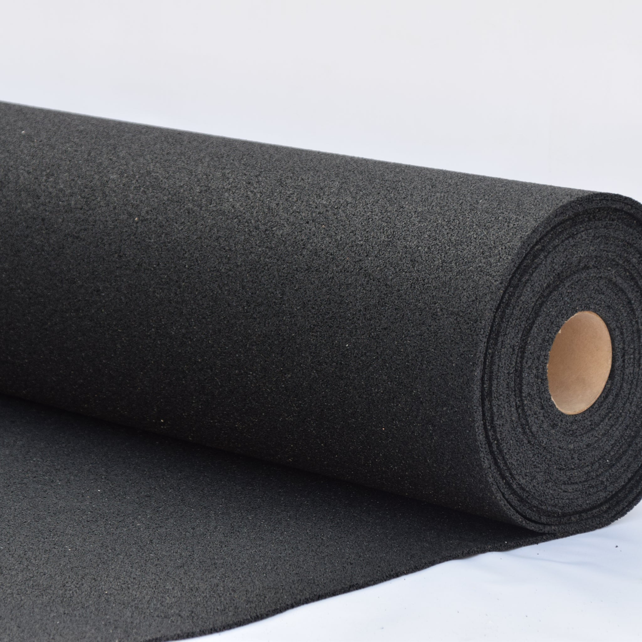 Roll of black gym floor insulation material on a white background