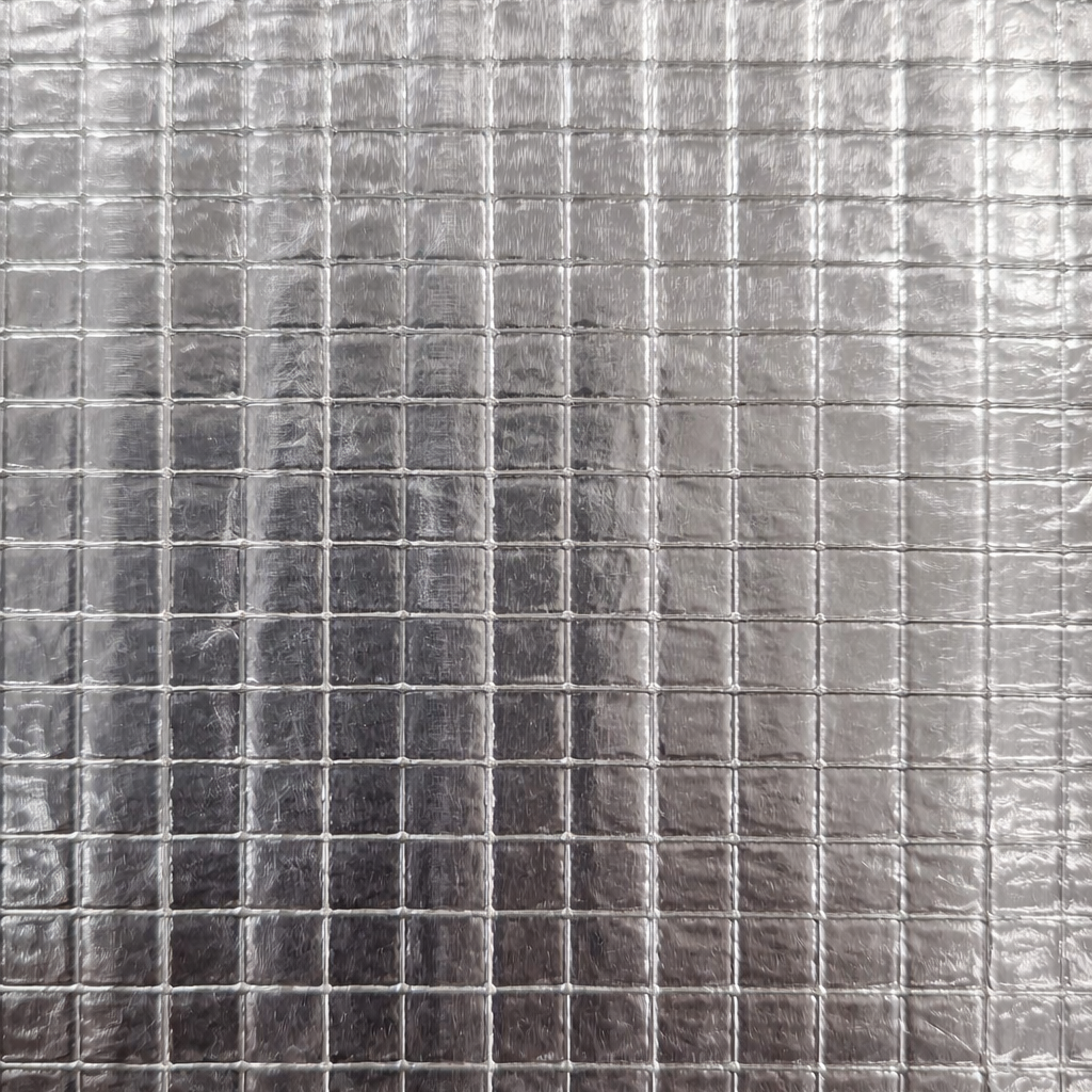 Close-up of the reinforced foil surface on SilenceCORE acoustic lagging