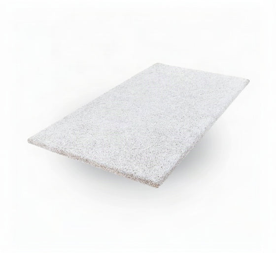 A rectangular white textured acoustic wall and ceiling pad shown floating at an angle on a clean white background.