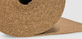 Roll of cork material on a white background