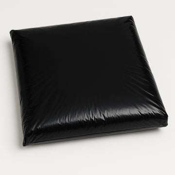 Black Square Acoustic Ceiling Pad, Infilled with RWA45 Rockwool, white background - studio lighting.