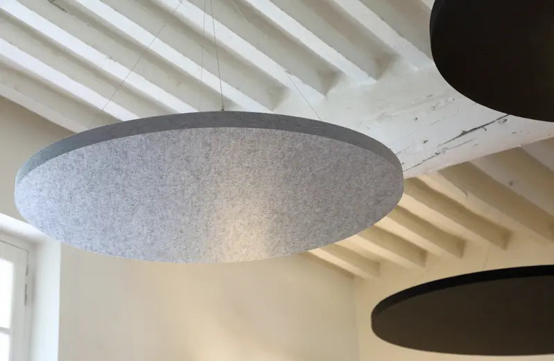 Round gray Pure-Kutik Panel on a white background